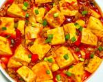 制作麻婆豆腐时，豆腐焯水的时间长短对口感有什么影响？