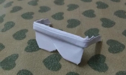 （手工折纸）怎么用纸折一个逼真的眼镜