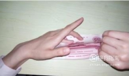 伏案式多指多张点钞法怎么点