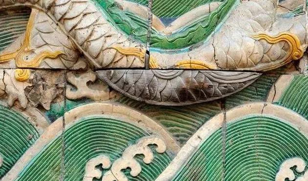 故宫九龙壁中为什么有块木头龙腹