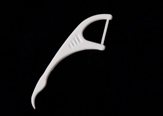 牙线棒的使用方法