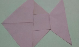 怎么用七巧板拼小鱼